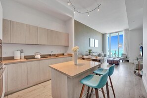 Deluxe Studio Suite, Balcony, Sea View | Private kitchen | Mini-fridge, microwave, oven, stovetop