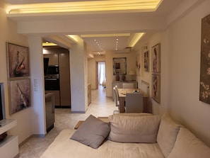 Deluxe Apartment, Courtyard View | Living area - Zeus Luxury Suite in Nea Flogita (Flogita)