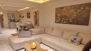 Deluxe Apartment, Courtyard View | Living area - Zeus Luxury Suite in Nea Flogita (Flogita)