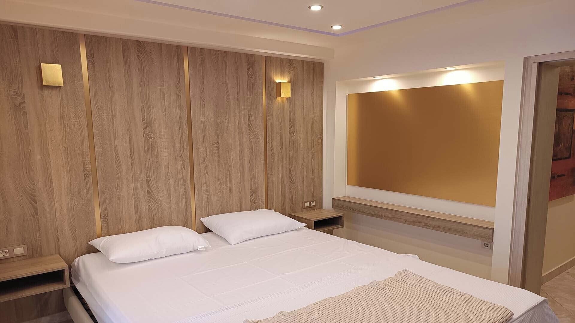 Appartamento Deluxe, vista cortile | Tende oscuranti, ferro/asse da stiro, Wi-Fi gratuito