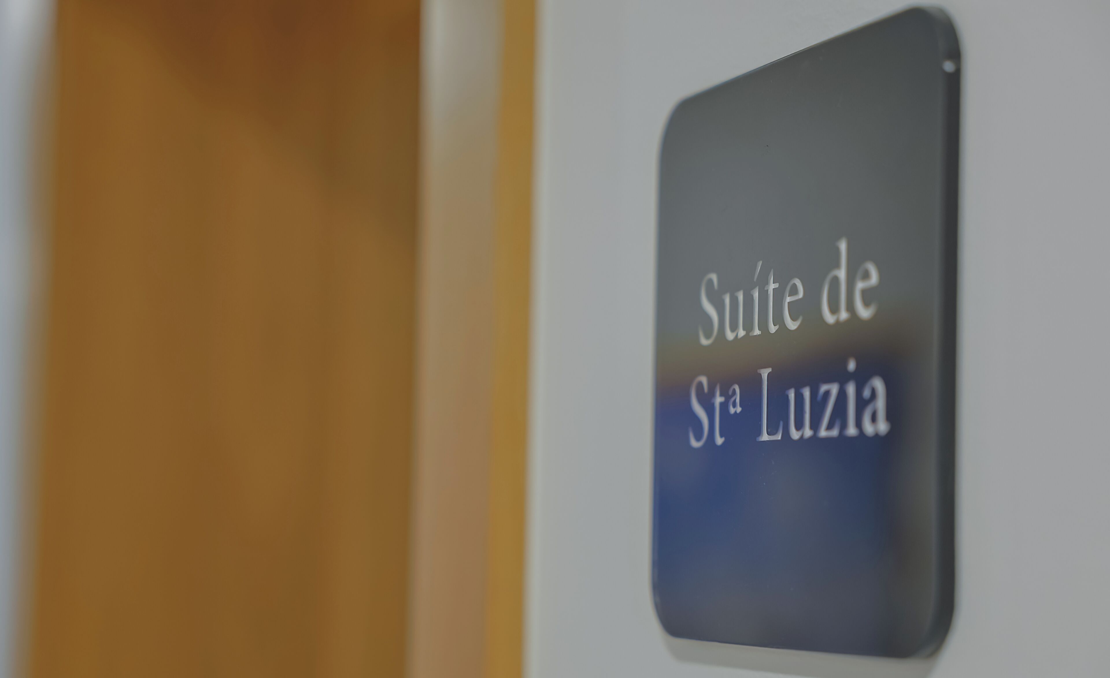 Un cartel con el texto 'Suite de St. Luzia'.