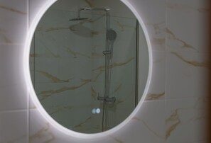 Shower, hair dryer, towels, soap