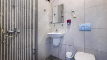 Departamento familiar, vista al jardín | Baño