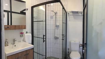 Suite, Sea View | Bathroom | Hair dryer, towels, soap, shampoo