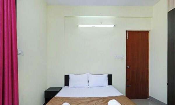 Golden Bells Service Apartments - Mysuru