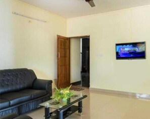 Classic Apartment, Balcony, City View | Living area - Golden Bells Service Apartments (Mysuru)