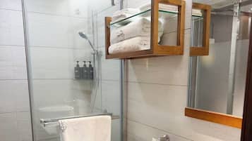 Shower, free toiletries, hair dryer, slippers