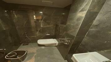 Shower, towels, soap, shampoo