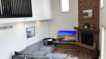 Smart TV, fireplace, books