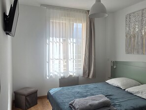 Room - Cozy T3 in La Roche-Posay with Balcony and Wifi (La Roche-Posay)