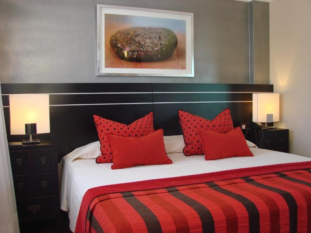 Suite, City View | In-room safe, laptop workspace, blackout curtains, iron/ironing board