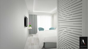 A modern bedroom with a bed, a TV, a nightstand, and a window with curtains. - Selyria Resort (Zakynthos)