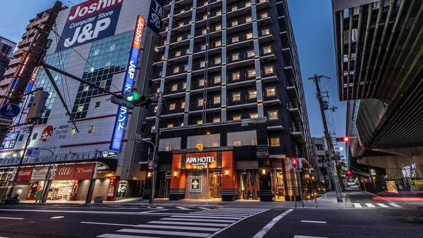 A multi-story building with a prominent J&P sign, an APA Hotel, and various commercial establishments. - Apa Hotel A Namba Minami Ebisucho Ekia (Osaka)