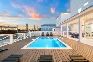 A heated pool - Brand New Luxe Home for Family Gatherings • Elevator • Gulf Views + Heated Pool (Panama City Beach)
