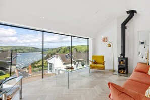 TV, fireplace - The Bridge - Architect Designed Luxury with Panoramic River Dart Views (Kingswear)