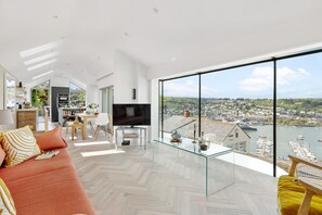 TV, fireplace - The Bridge - Architect Designed Luxury with Panoramic River Dart Views (Kingswear)