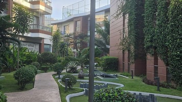 Comfort Apartment, Balcony, Pool View | Property grounds