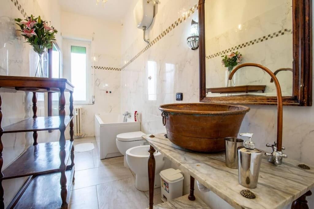 Hair dryer, bidet, towels, soap