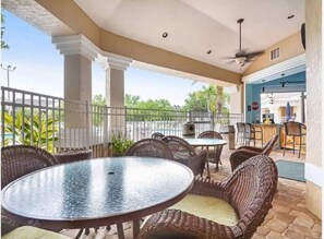 Outdoor dining - 203-2 Windsor Palm 3BR Resort Pool Next to Disney (Kissimmee)