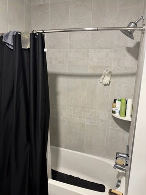 Shower, towels, toilet paper