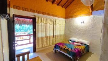 Deluxe Double Room, Patio, Pool View | In-room safe, blackout curtains, iron/ironing board