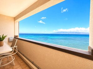 A balcony with a view of the ocean and a mountain range. - Sands of Kahana 2 Oceanfront Villas, Sleeps 16 | Car Incl. w/ 6 nights | ML-4052 by KBM (Lahaina)
