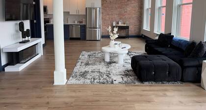 Bright Sunlit Studio in Downtown Rochester Floor-to-Ceiling Windows