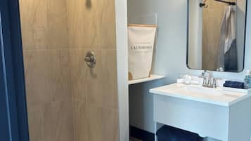Shower, towels, soap, toilet paper