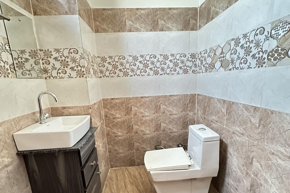 Habitación Deluxe | Baño | Regadera, toallas, jabón