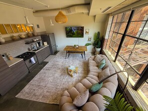 Living area - Designer Loft at Ponce City Market with Natural Light & Murals (atlanta)