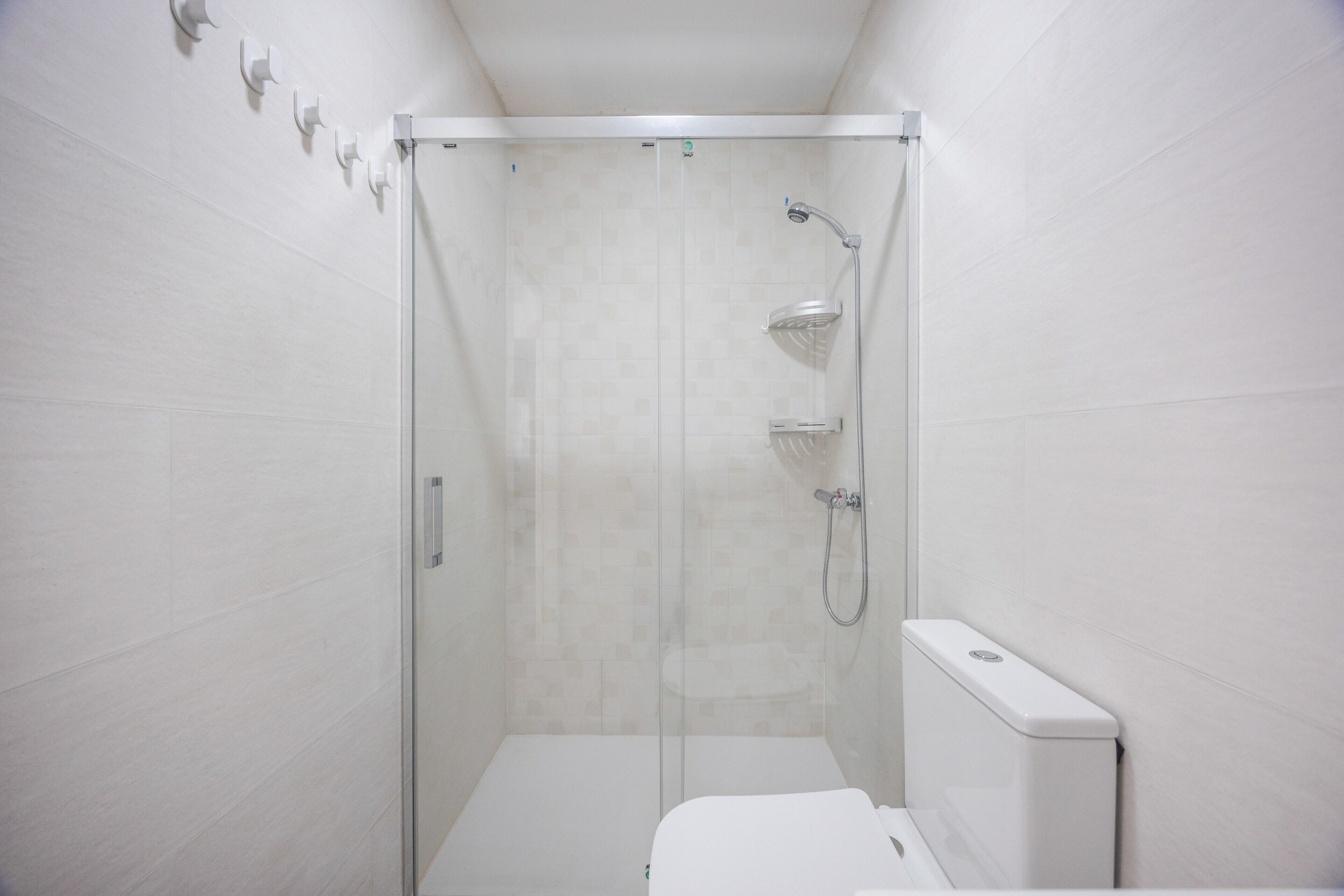 Een douche, handdoeken