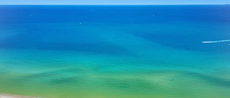 On the beach, sun loungers, beach towels