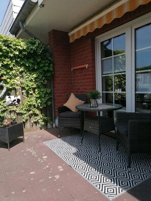 Outdoor dining - Vacation apartment Stan & Oli (Dornumersiel)