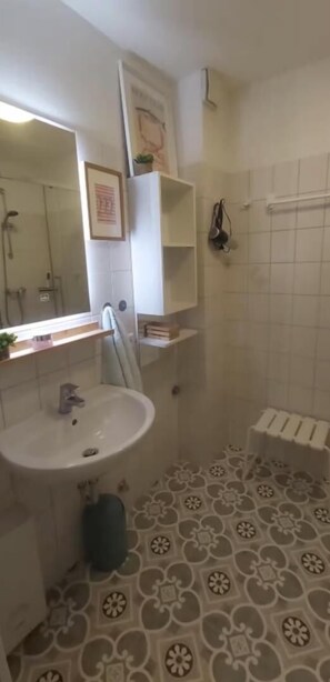 Ducha y secador de pelo