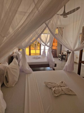 Superior Quadruple Room, Balcony, Courtyard View | Desk, laptop workspace, blackout drapes, soundproofing - Sunny villa matemwe (Matemwe)
