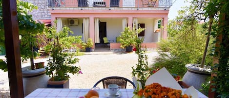 Apartment, 2 Bedrooms, Terrace, Garden View | Outdoor dining