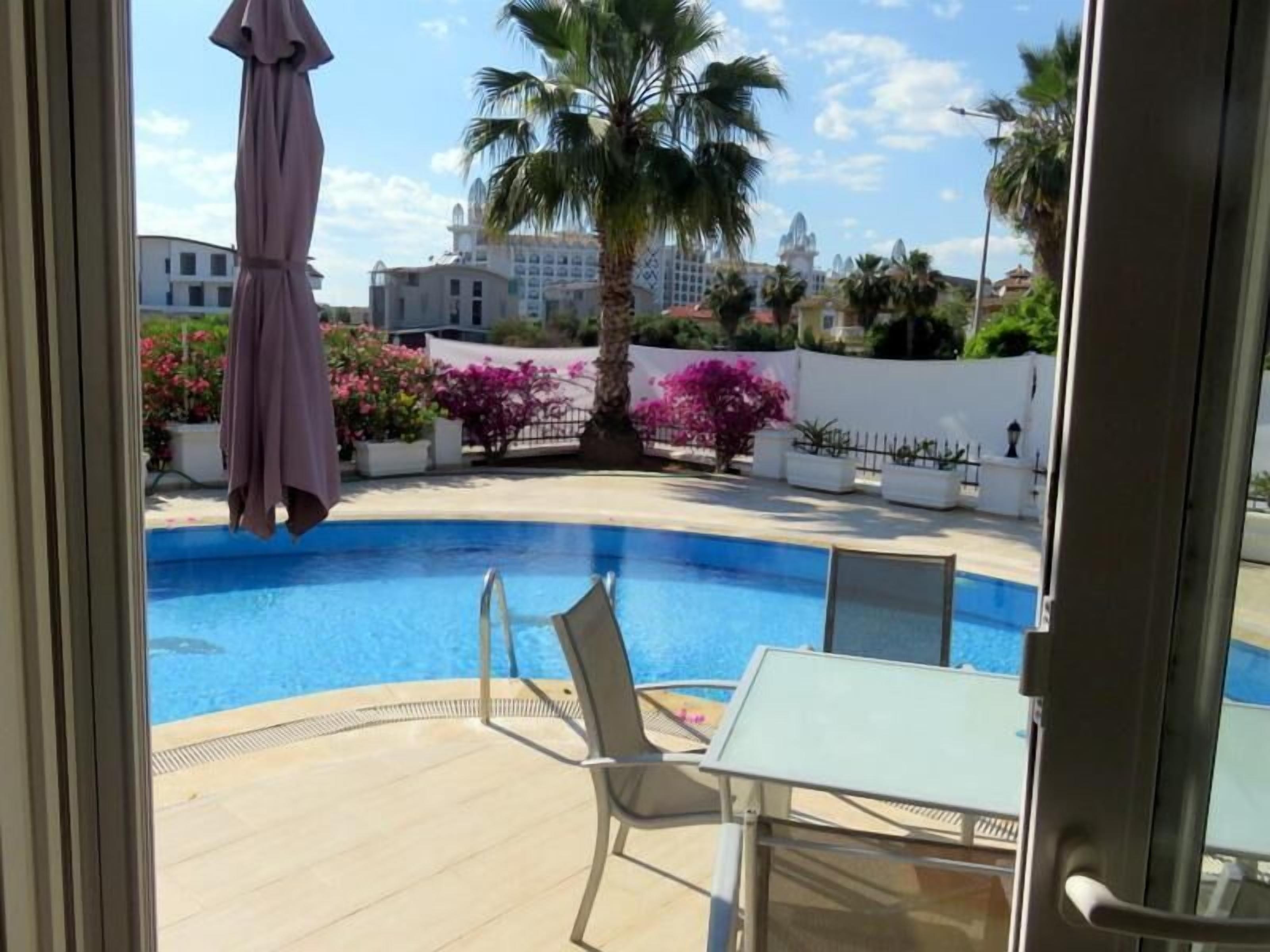 Villa, Balcony, Pool View | Pool | Seasonal outdoor pool