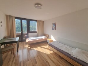 Room - Budget Studio Apartments 31' with Mountain View, Shared Pool & Wi-Fi (Bad Herrenalb)