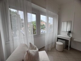 Quarto casal superior | Área de estar