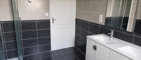 Shower, towels, toilet paper