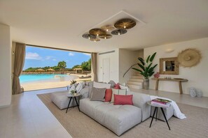 Living area - Exclusive design villa facing Cabrera (Ses Salines)