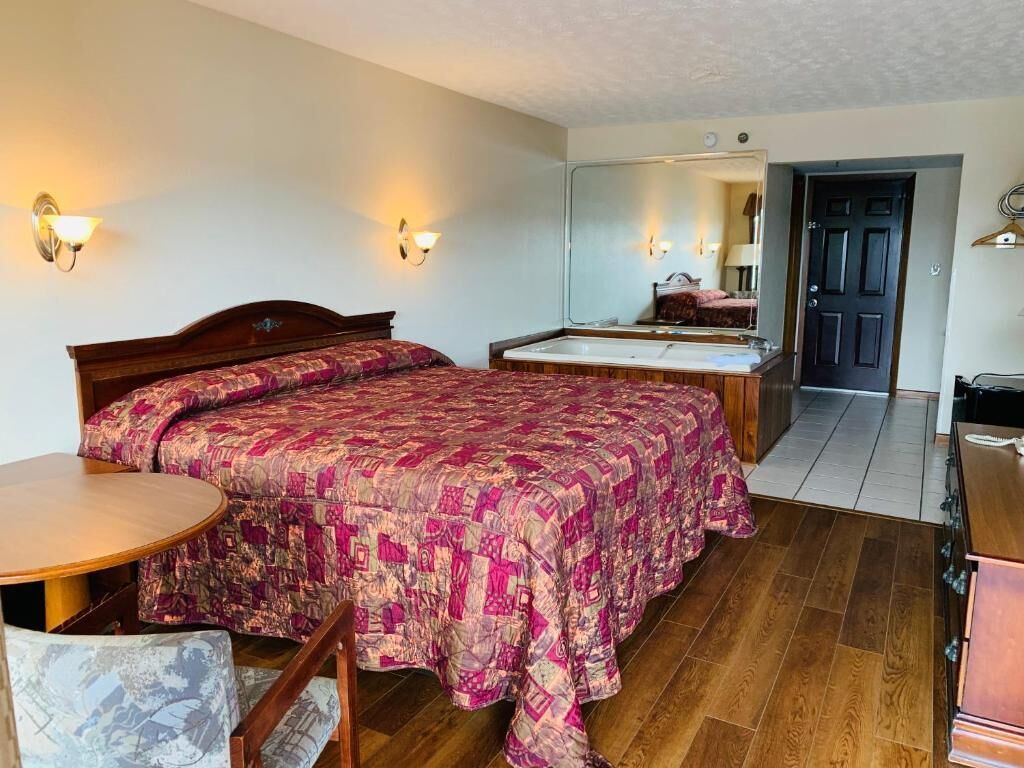 Deluxe Suite, Balcony, River View | Blackout drapes, soundproofing, iron/ironing board, free WiFi