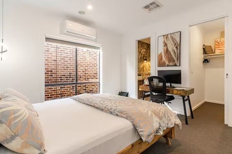 Iron/ironing board, WiFi, bed sheets. Private master bedroom + attached ensuite bathroom in a welcoming shared home
