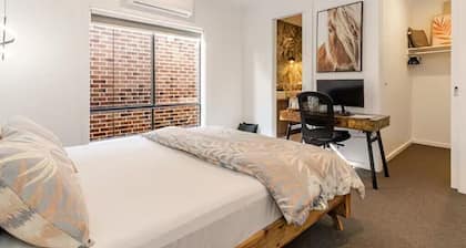 Private master bedroom + attached ensuite bathroom in a welcoming shared home