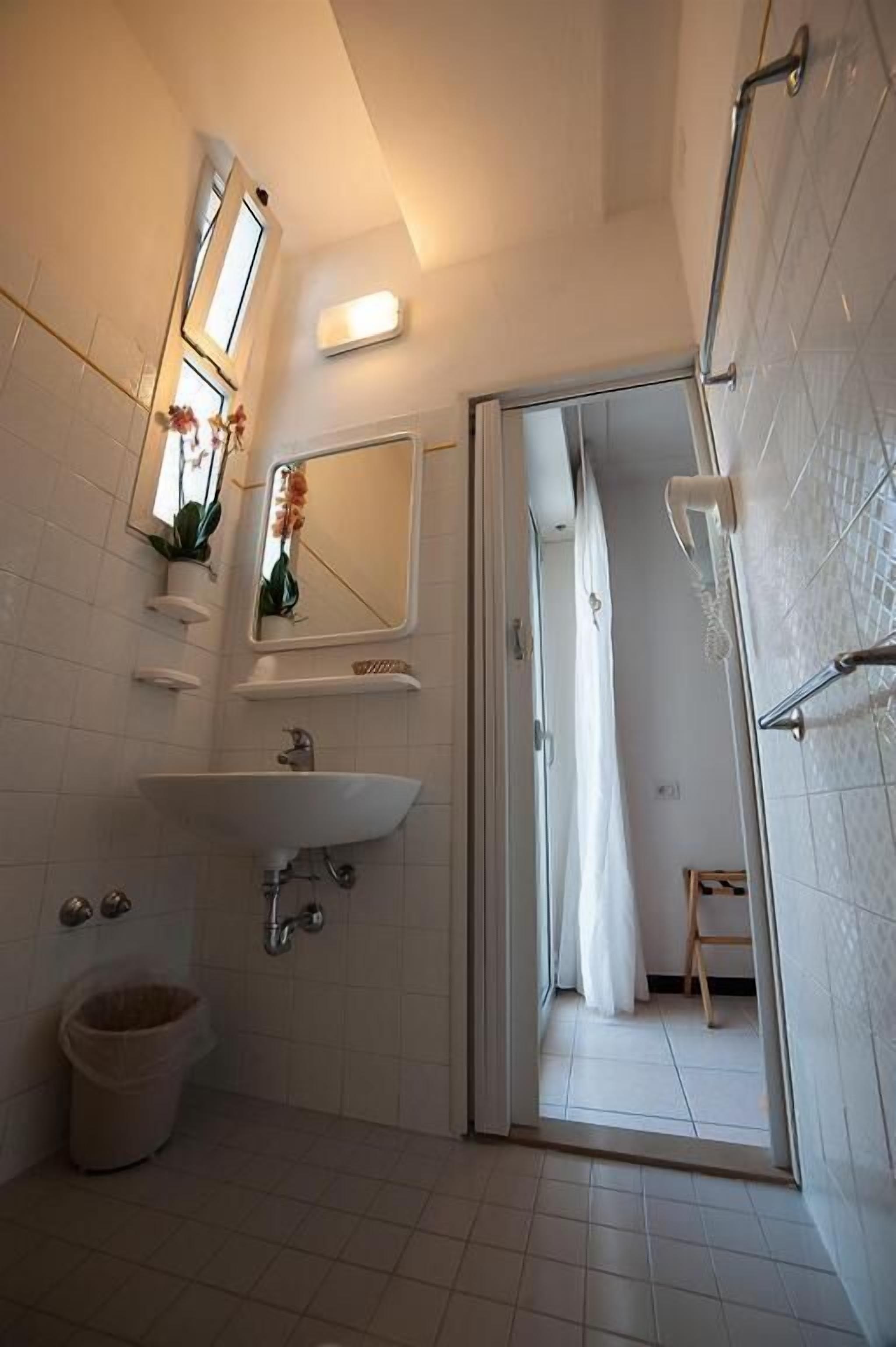 Separate tub and shower, hair dryer, towels, soap