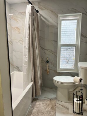 Hair dryer, towels, soap, toilet paper