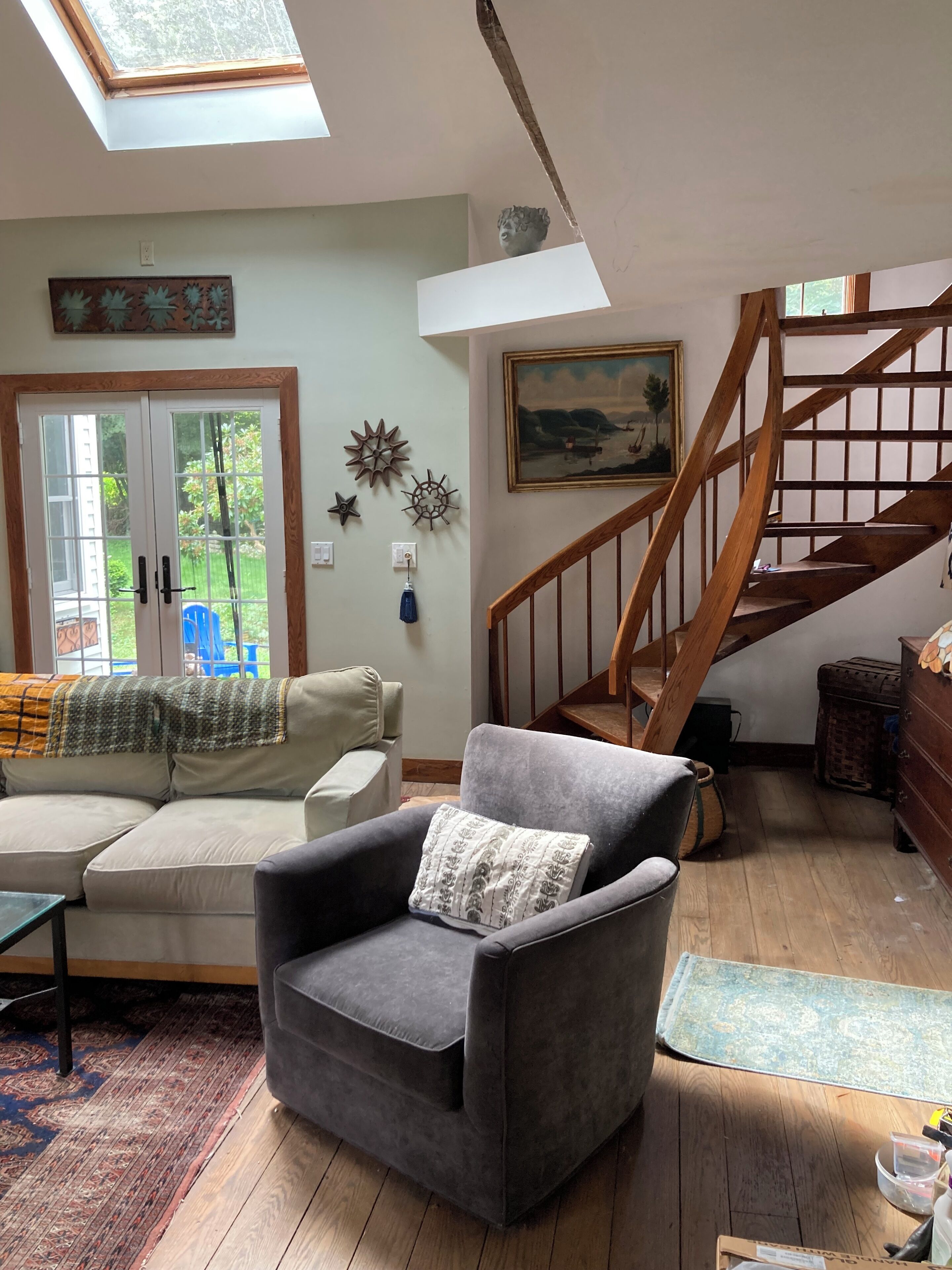 Spiral staircase leads to private loft bedroom
