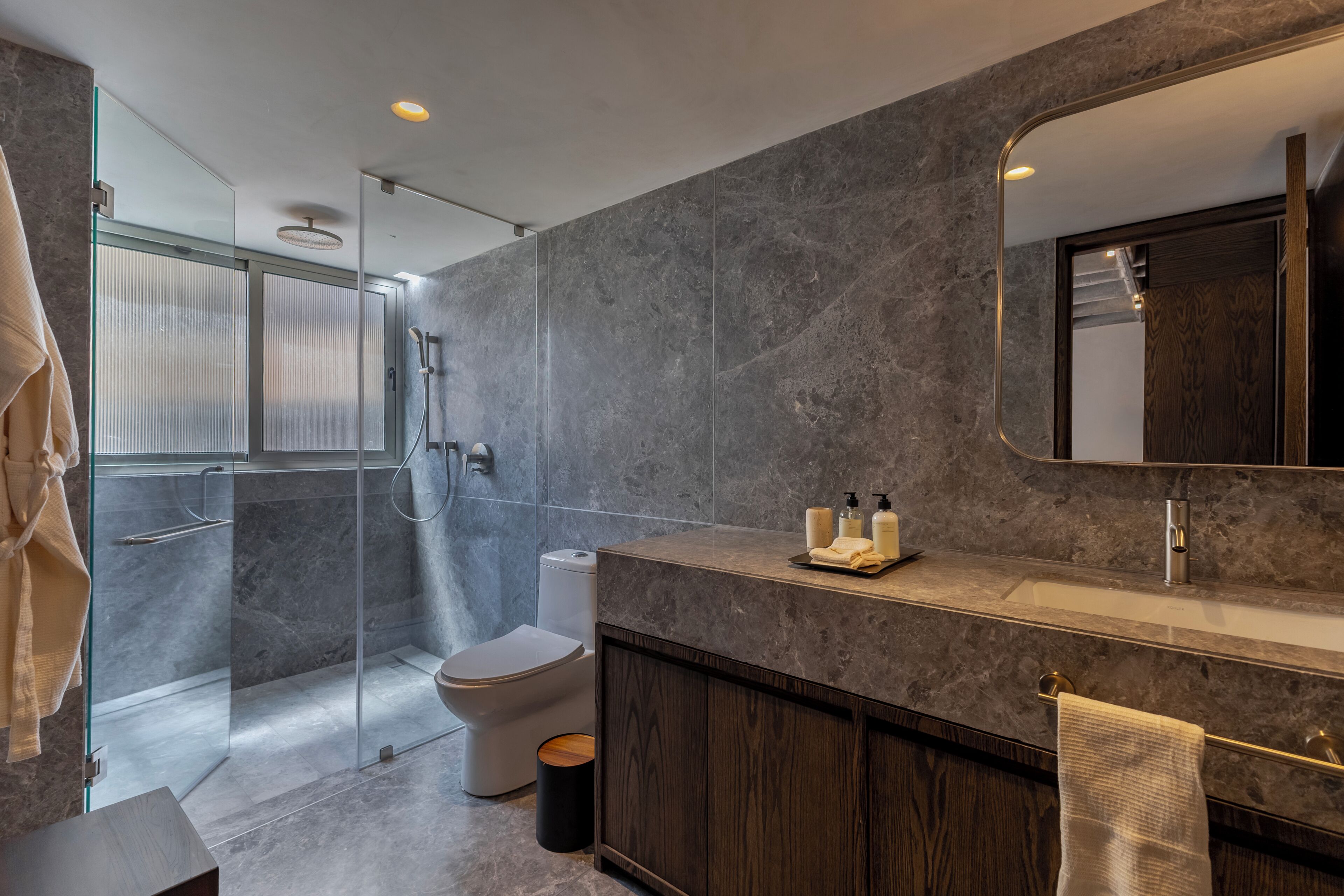 Premium Studio | Bathroom | Shower, hair dryer, towels, soap