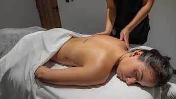 Massages aux pierres chaudes, massages des tissus profonds
