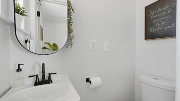 Hair dryer, towels, soap, toilet paper